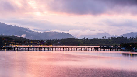 Uttama Nusorn Wooden Bridge, Mon bridge itâs longest wooden bridge in Thailand across the Songgaria river, Sangkhlaburi, Kanchanaburi Province at Morning.の写真素材