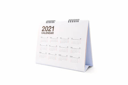 White paper desk spiral calendar 2021 on white background.の写真素材