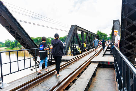 Thailand, Kanchanaburi - October 6, 2019: Tourist visit The Bridge of the River Kwai is a history of world war ii, the death railway bridge over Kwai river built by Japanese soldiers, Kanchanaburi, Thailand.のeditorial素材