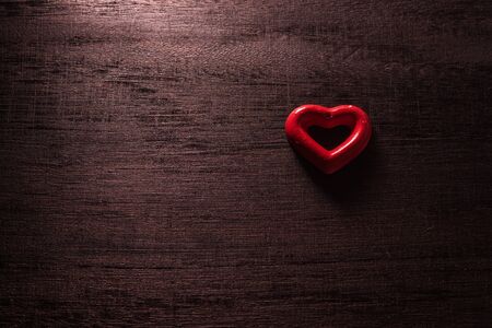 selective focus Valentines Day background with hearts. on wood table still lifeの写真素材