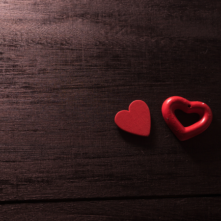 selective focus Valentines Day background with hearts. on wood table still lifeの写真素材