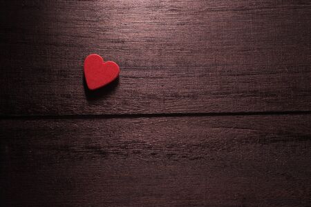 selective focus Valentines Day background with hearts. on wood table still lifeの写真素材