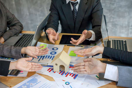 Working as a teamwork of real estate businesses.
