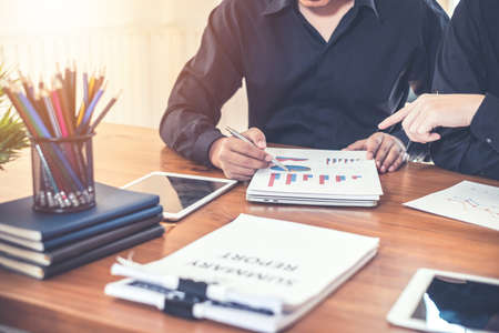 Investors Group. Business people working together in the meeting.