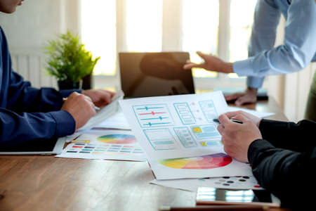 Teamwork designer ui ux brainstorm ideas about designing on mobile apps.の写真素材