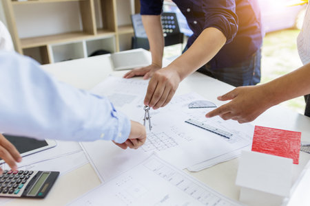 Group of engineers working together to plan the project at the meeting.の写真素材