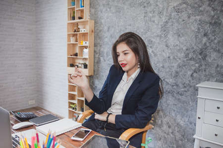 Business woman working in officeの写真素材