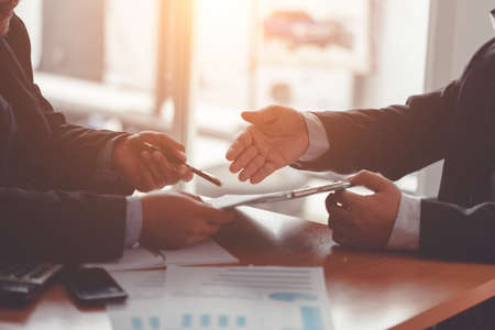 Business people meeting time working with new startup project. Idea presentation, analyze plans.の写真素材