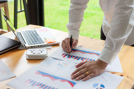Businessman working with office finance documentsの写真素材