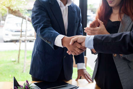 Business handshake. Business executives to congratulate the jointの写真素材