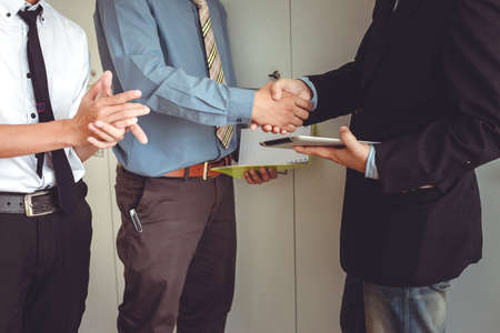 Business shaking hands. Business executives to congratulate the joint.の写真素材