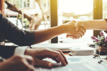 Business people shaking hands. Business executives to congratulate the joint.の写真素材