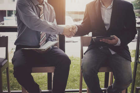 Business shaking hands. Business executives to congratulate the joint.の写真素材
