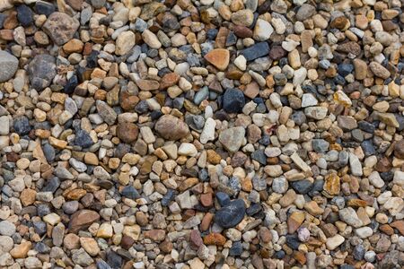 Small pebbles rock backgroundの写真素材