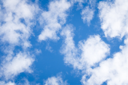 Blue sky with white cloud backgroundの写真素材