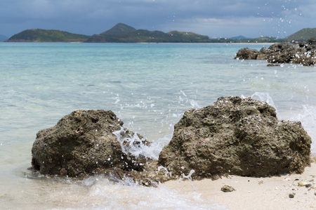 Rock on the beach with sea. Samae San island, Thailand.の写真素材