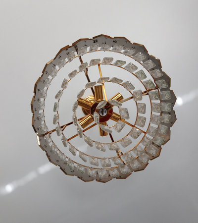 Ceiling lamp made of glass and metal on white background.の写真素材