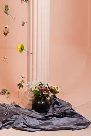 flowers in vase on the background of the columns and wallの写真素材