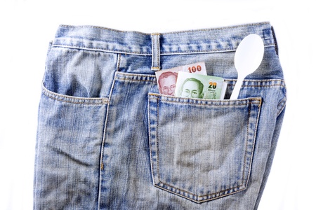 Filthy jean pocket have a money closeup isolateの写真素材