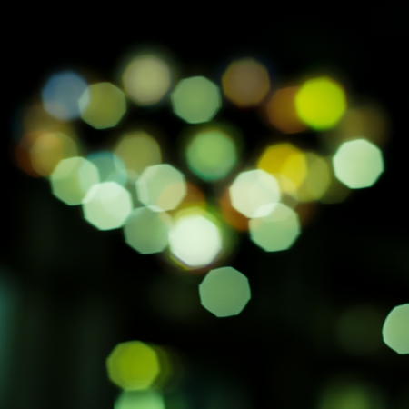 glowing lights background with bokehの写真素材