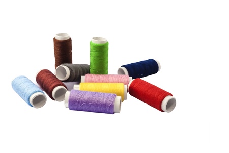 Colourful  thread on a white background