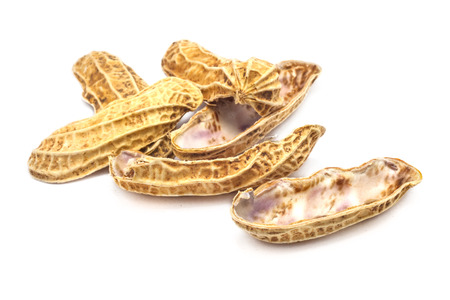 Dried peanuts in closeup isolate