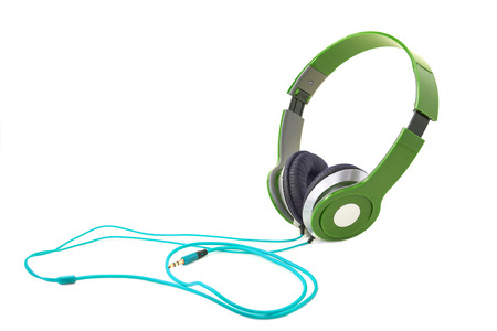 Purple headphones isolated on a white backgroundの写真素材