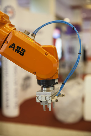 BANGKOK, THAILAND - February 3 An industrial robot hands help to work hard February 3,2014 in Bangkok,Thailand のeditorial素材