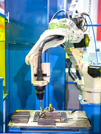 BANGKOK ,THAILAND - MAY 17: Mini Robots Hand in ASEAN's Leading Industrial Machinery and Subcontracting Exhibition 2014,on May 17, 2014 in Bangkok, Thailand.のeditorial素材