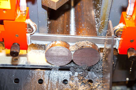 BANGKOK ,THAILAND - MAY 18 industrial band-saw cutting a steel ASEANのeditorial素材