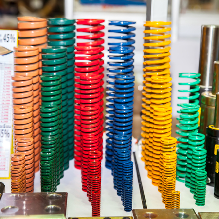 BANGKOK ,THAILAND - MAY 18 industrial springs suspension in red, green ASEAN