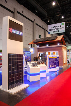 BANGKOK - JUNE 4   KYOCERA Show Solar panel on a red roof at Renewable Energy Environmental Technology on June 4,2014 in BITEC ,Bangkok, Thailand のeditorial素材