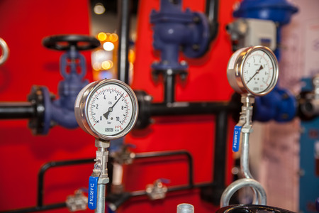BANGKOK - JUNE 4   Steam pipe with a valve and manometer at Renewable Energy Environmental Technology on June 4,2014 in BITEC ,Bangkok, Thailand のeditorial素材