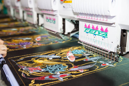 BANGKOK - JUNE 28  Industrial Embroidery Machine at Garment Manufacturers Sourcing 2014 on June 28,2014 in BITEC ,Bangkok, Thailand のeditorial素材