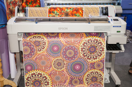 BANGKOK - JUNE 28  Digital textile belt printer at Garment Manufacturers Sourcing 2014 on June 28,2014 in BITEC ,Bangkok, Thailand のeditorial素材