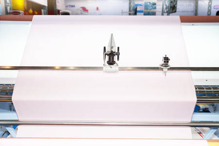 BANGKOK - JUNE 28  auto measure of fabric in roll tool at Garment Manufacturers Sourcing 2014 on June 28,2014 in BITEC ,Bangkok, Thailand のeditorial素材