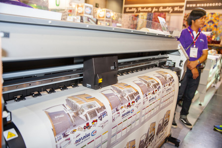 BANGKOK - JUNE 28  Professional printing machine at Garment Manufacturers Sourcing 2014 on June...