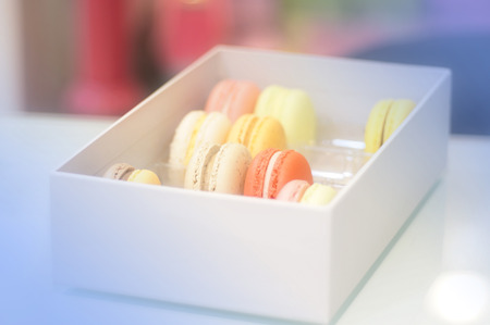 Sweet and colourful french macaroons on retro-vintage backgroundの写真素材