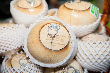 BANGKOK - JUNE 19 :New technologie to open Fresh Coconut Water Drink display at IPIEx EXPO 2014 on June 19,2014 in BITEC ,Bangkok, Thailand.のeditorial素材