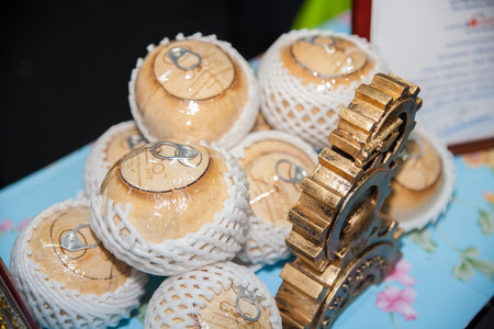 BANGKOK - JUNE 19 :New technologie to open Fresh Coconut Water Drink display at IPIEx EXPO 2014 on June 19,2014 in BITEC ,Bangkok, Thailand.のeditorial素材