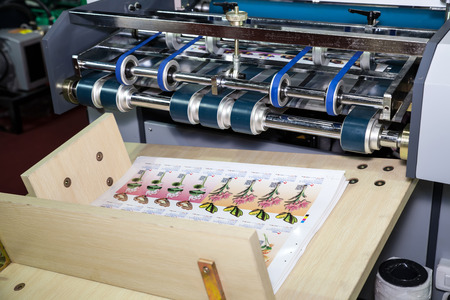 BANGKOK - SEPTEMBER 27 :Print media from printing machines display at GASMA PRINT 2014 on Sep 27,2014 in BITEC ,Bangkok, Thailand.のeditorial素材