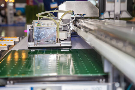 BANGKOK - SEPTEMBER 27 :Modify header of inkjet for hard materials machines at GASMA PRINT 2014 on Sep 27,2014 in BITEC ,Bangkok, Thailand.のeditorial素材