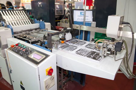 BANGKOK - SEPTEMBER 27 :News Paper printing machines display at GASMA PRINT 2014 on Sep 27,2014 in BITEC ,Bangkok, Thailand.のeditorial素材