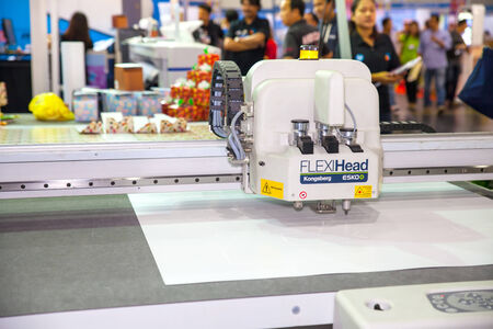 BANGKOK - SEPTEMBER 27 :Drawing and cutting machines at GASMA PRINT 2014 on Sep 27,2014 in BITEC...