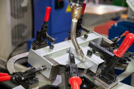 BANGKOK - SEPTEMBER 22 :robots welding in a car factory  display at METALEX 2014 on Nov 22,2014 in BITEC ,Bangkok, Thailand.のeditorial素材