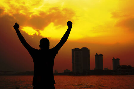 Silhouette man on the sunset