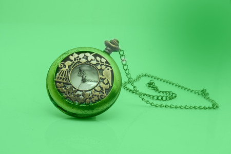 Old dirty pocket watch isolated on whiteの写真素材