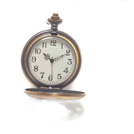 Old dirty pocket watch isolated on whiteの写真素材