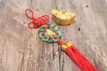 Chinese New Year Ornament--Gold ingots with blessing wordの写真素材