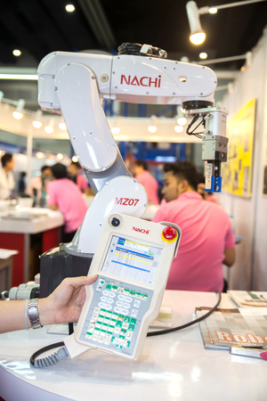 BANGKOK ,THAILAND - FEBRUARY 7: Controler of robotic hand 
at THAILAND Industrial Fair 2015 And Food Pack Asia 2015 
on February 7, 2015 in Bangkok, Thailand.のeditorial素材